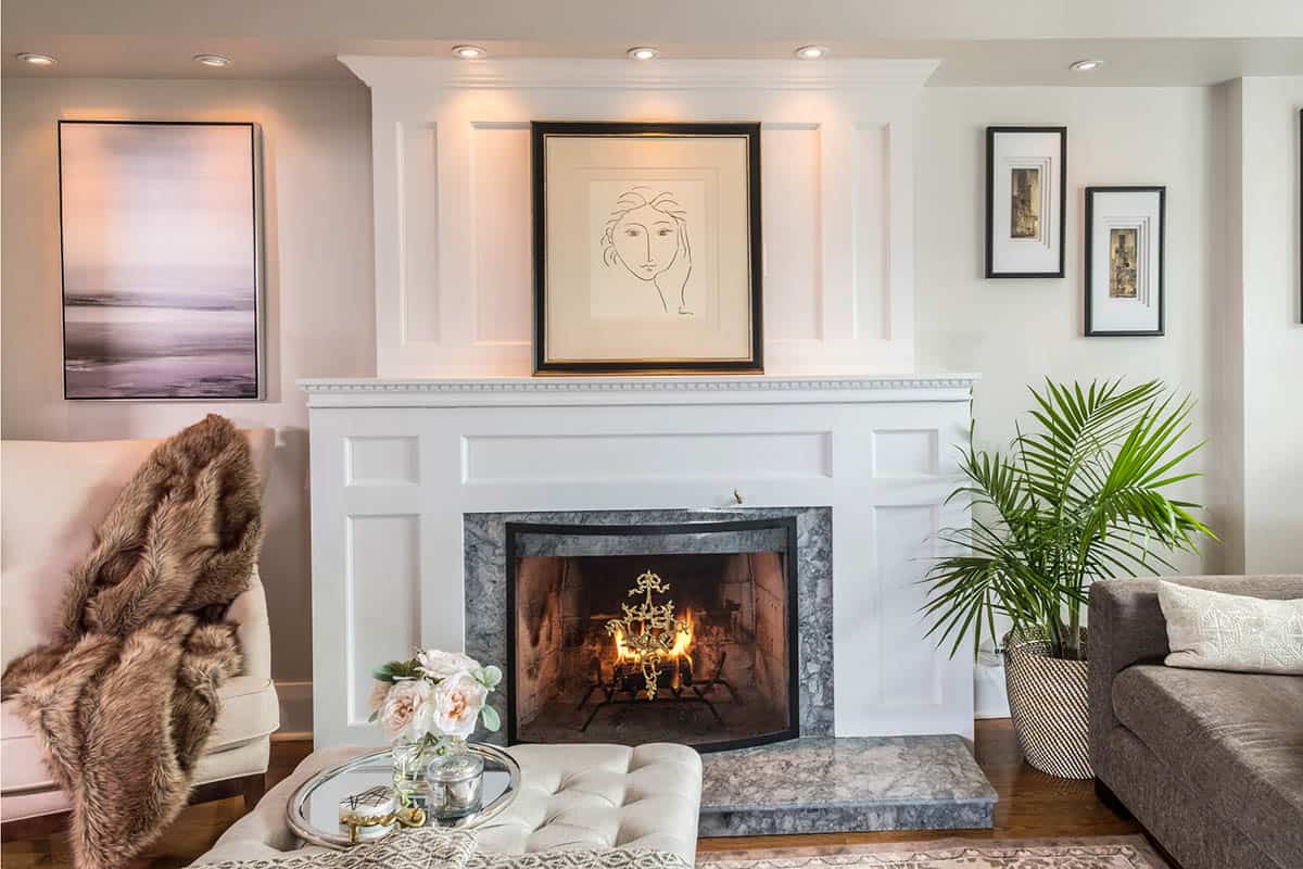 art painting above mantle in a luxury home